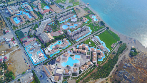 August 2017: Aerial drone photo of famous pools and 5 star resorts - hotels at small village of Kolympia bay, Rhodes island, Aegean, Dodecanese, Greece