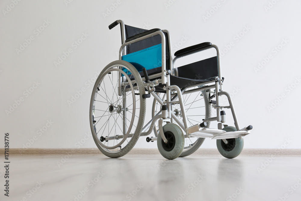 Wheelchair in light room. Elderly care concept