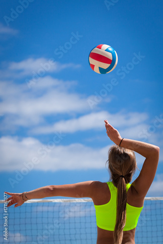 Volleyball Serve young girl with ponytail 