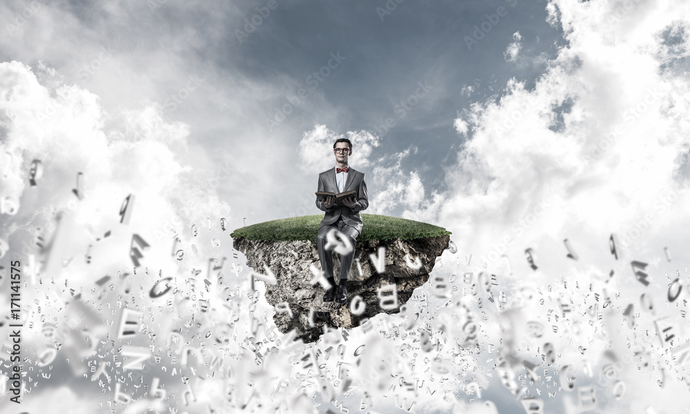 Obraz premium Young businessman or student studying the science and symbols fl