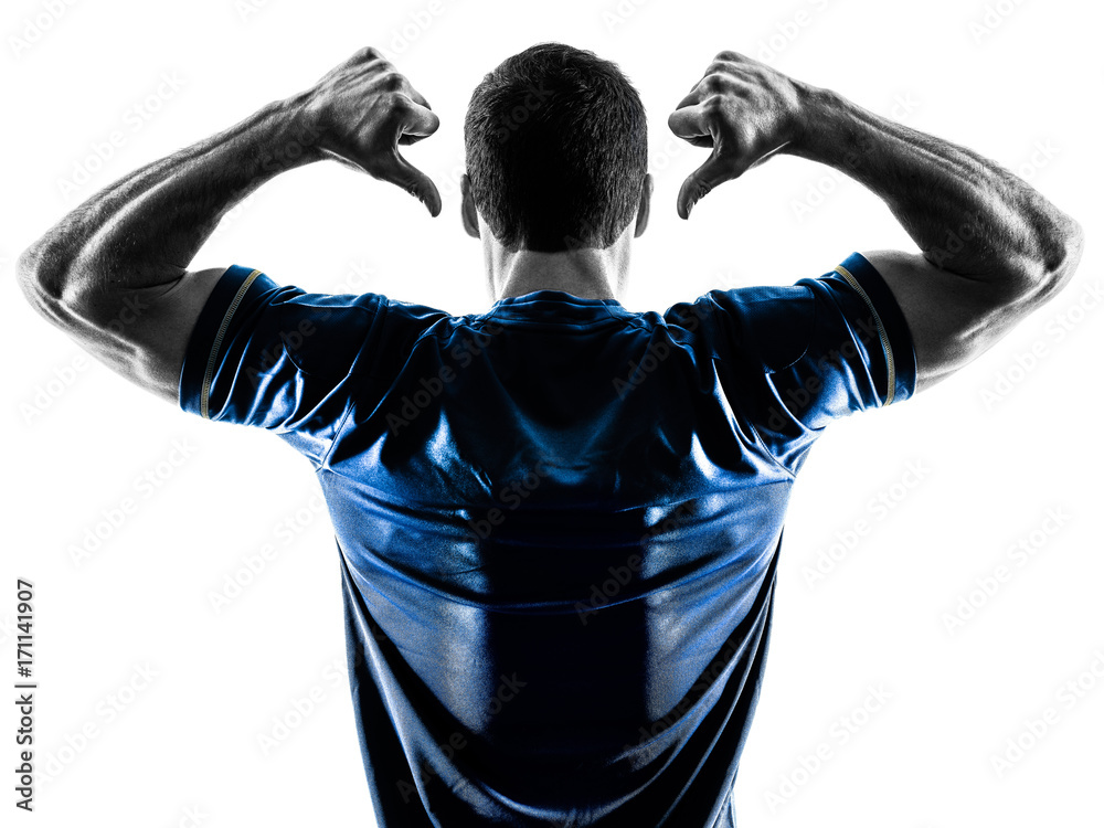 Fototapeta premium one caucasian soccer player man standing Rear View pointing in silhouette isolated on white background