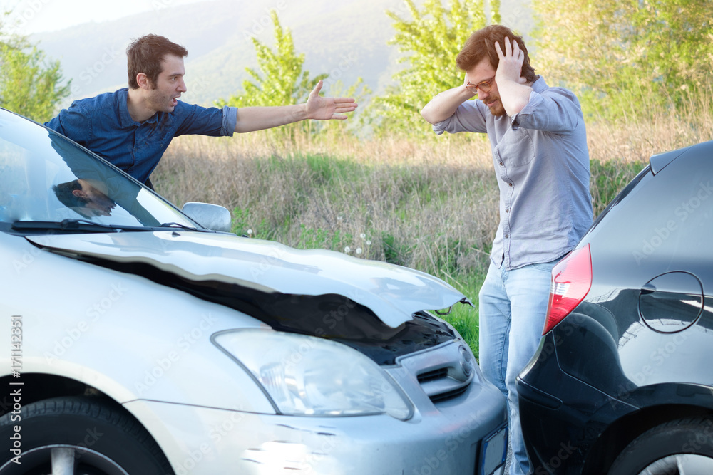 Two angry men arguing after a car crash Stock Photo | Adobe Stock