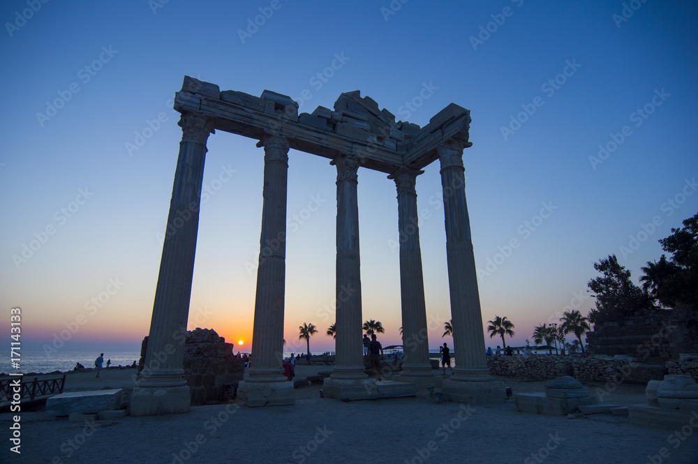 Fototapeta premium Temple of Apollo with a beautiful sunset background, in Side, Antalya, Turkey.