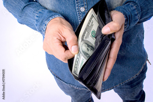 man holding wallet with dollars money on white background with clipping path