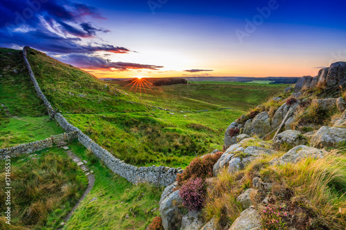Sunset at Hadrian's Wall in Northumberland, England photo