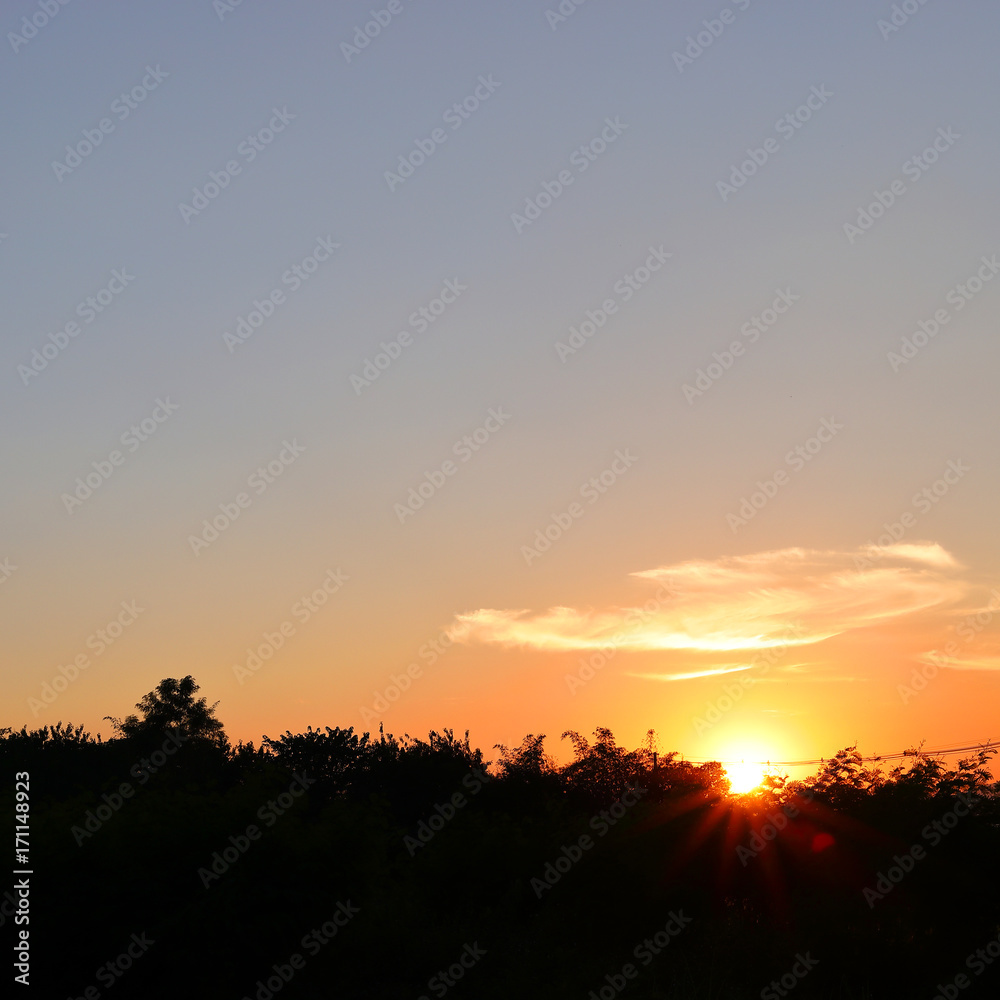 orange sun light on beautiful sunset clear blue sky background