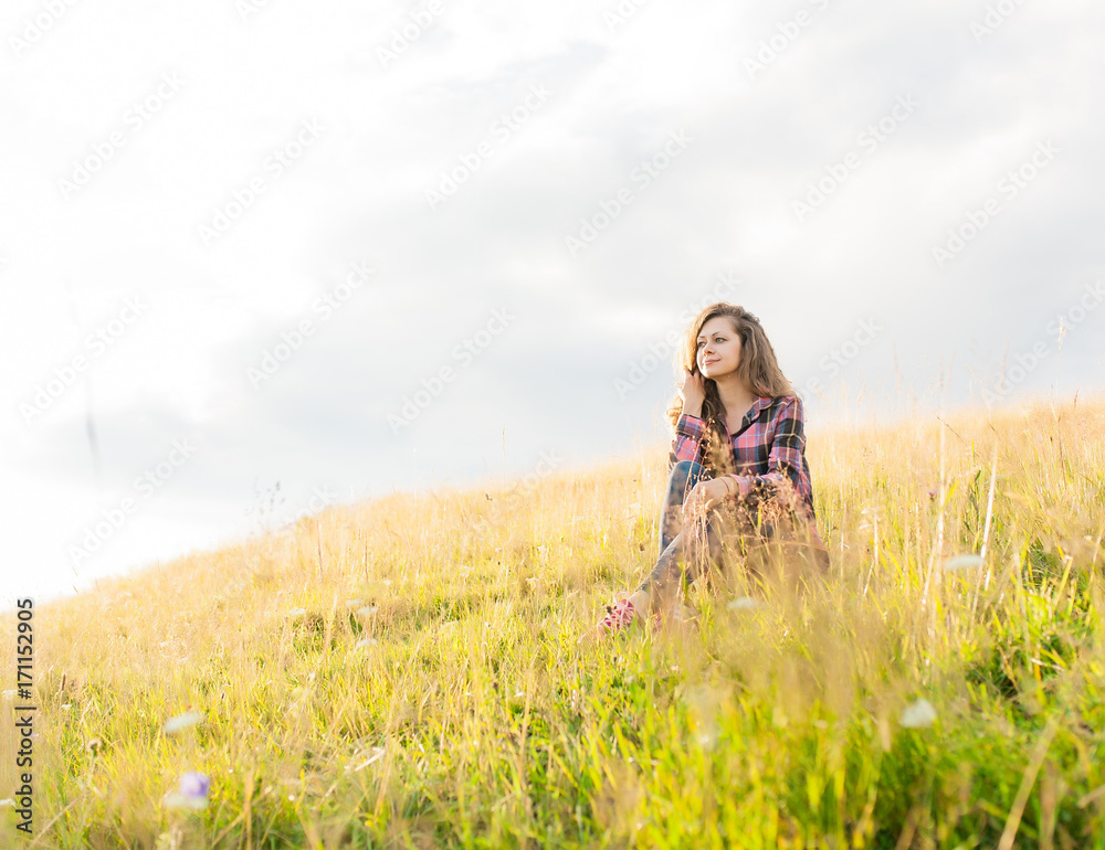 Yound girl on peak mountain with perfect view. Yound girl on peak mountain with perfect view.