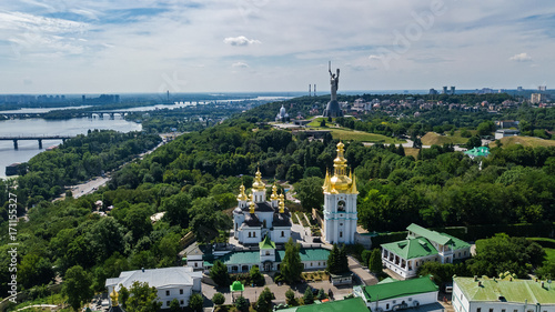 Aerial top view of Kiev Pechersk Lavra churches on hills from above, cityscape of Kyiv city, Ukraine 