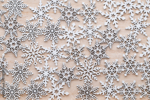 Christmas, New Year wooden decoration snowflake. © gitusik