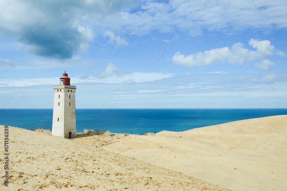 Lighthouse Rubjerg Knude and sand dunes at the danish North Sea coast, vintage style, Denmark, Europe