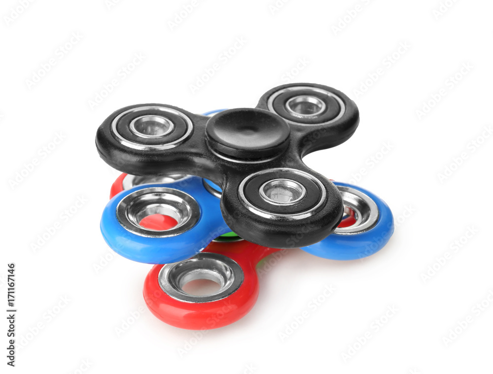 Different modern spinners, isolated on white Different modern spinners, isolated on white