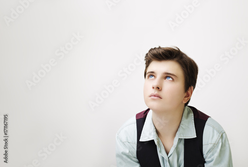 Stylish handsome young man posing on white background