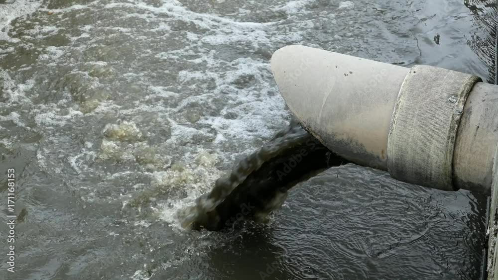 Sewage Farm Waste Water Flowing From Pipe