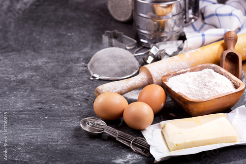 ingredients for baking and kitchen utensils photo