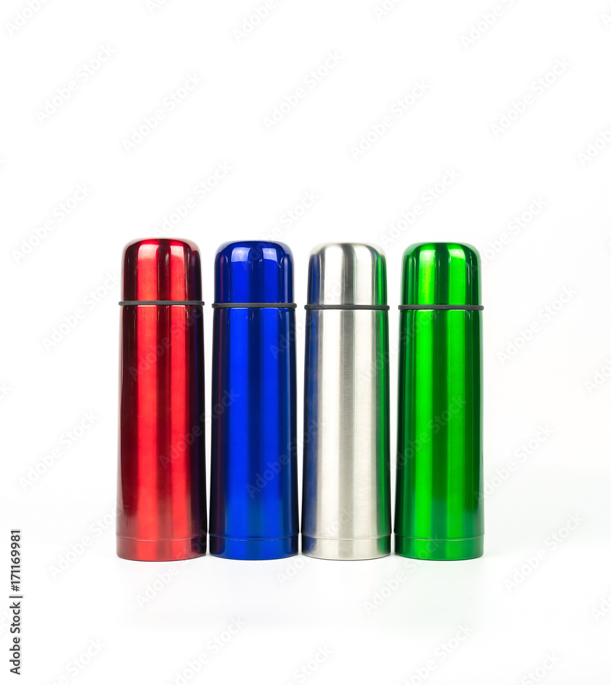 Red, blue, silver and green thermos bottles isolated on white background with copy space Red, blue, silver and green thermos bottles isolated on white background with copy space
