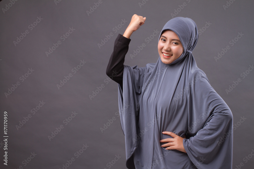 strong, successful muslim woman with hijab or head scarf