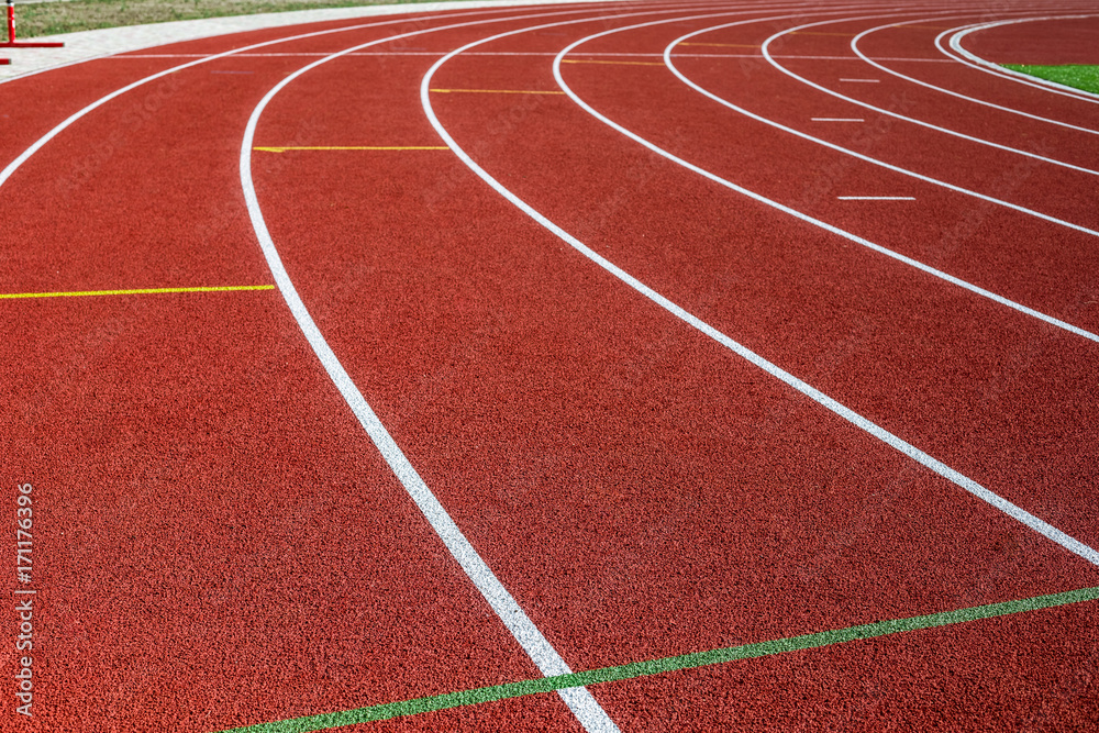 Red treadmill in sport field.