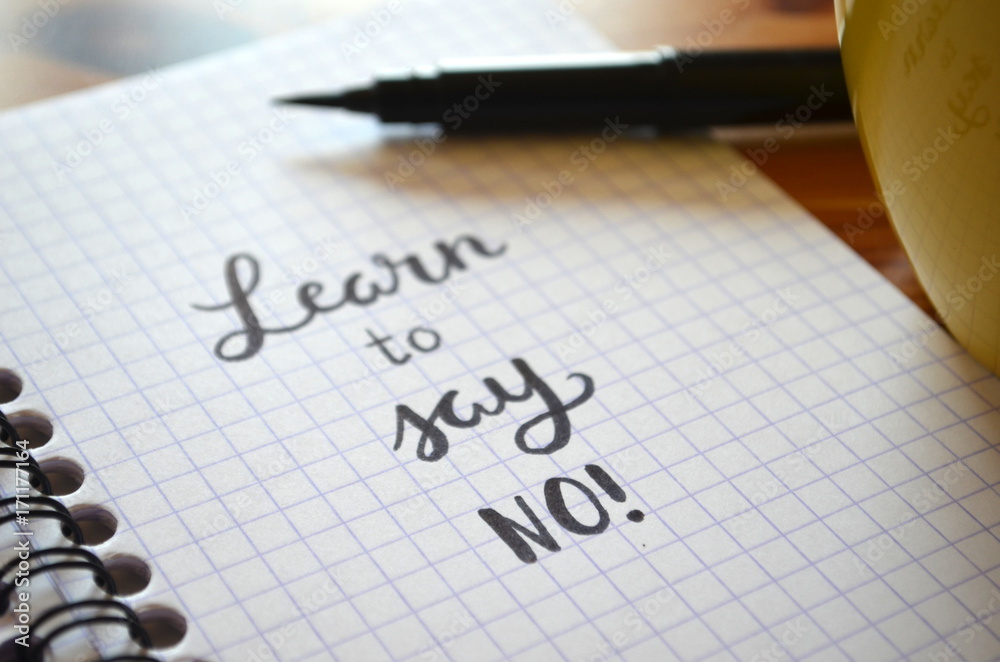Fotografie LEARN TO SAY NO hand-lettered in notebook