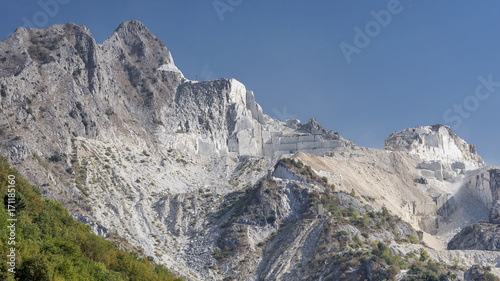 Magnificent panoramic view of the famous marble quarries of Colonnata, Carrara, Italy, on a sunny day