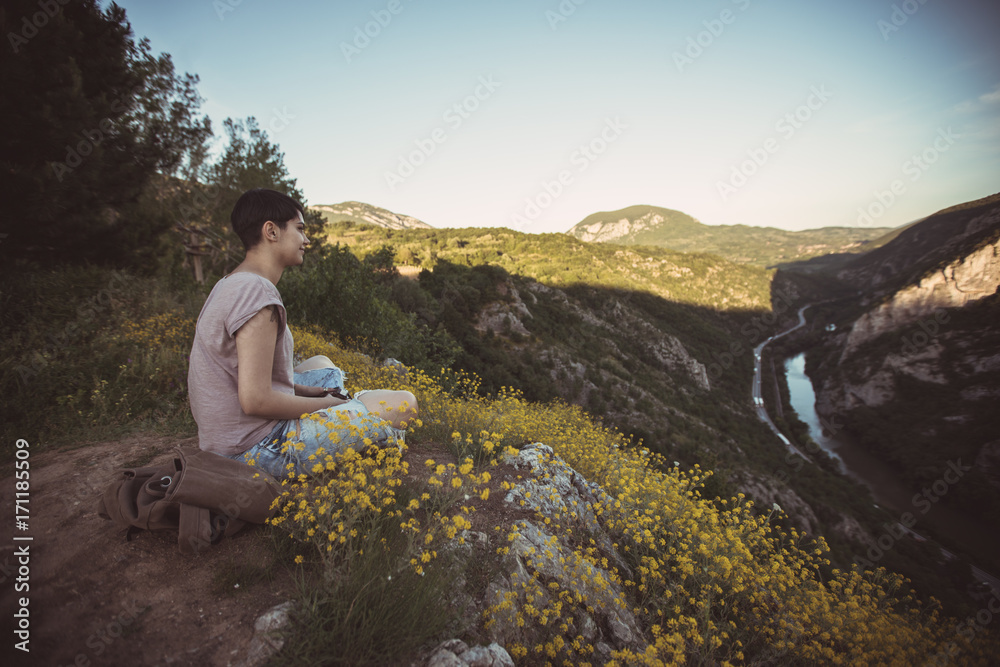 Naklejka premium Woman on mountain