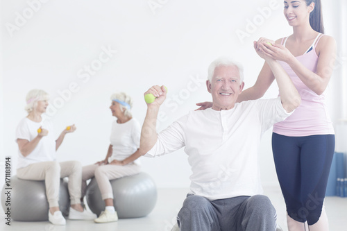 couch improving stretching elderly man