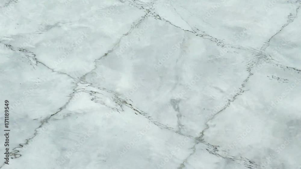 Waves of pure clear water in the swimming pool. The background of the water fluid flows. Cleaning and disinfecting pools. Waves of pure clear water in the swimming pool. The background of the water fluid flows. Cleaning and disinfecting pools.