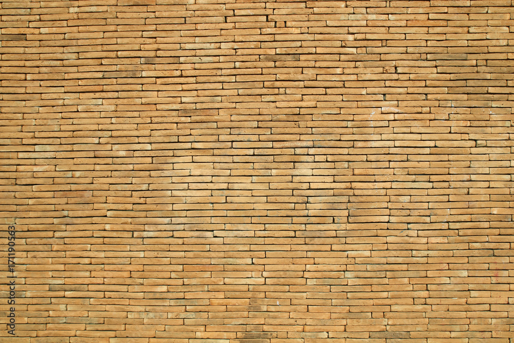 Old brick wall, old texture of red stone blocks closeup