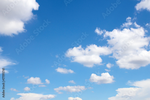 Beautiful white clouds with blue sky background