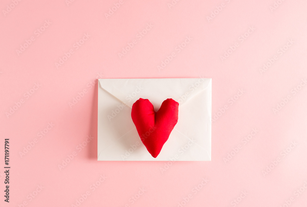 Love and Valentine's Day theme with heart cushions and envelope