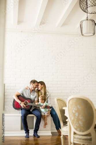 Heppy family with guitar photo