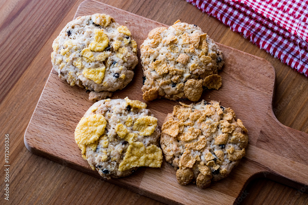 Cornflake Cookies on wooden surface.