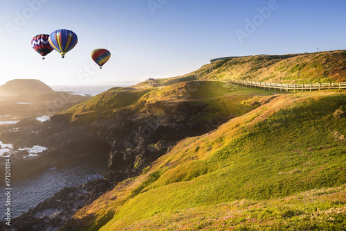 Hot air balloon flying over Philip lsland, Victoria, Australia