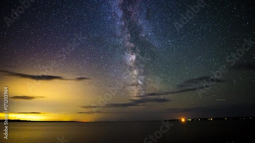 time lapse milky way moving over lake superior, Ontario, Canada photo