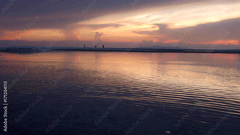 Dusk scene of the sea at the beach Dusk scene of the sea at the beach