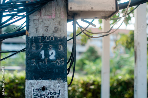 Electric pole and black wires