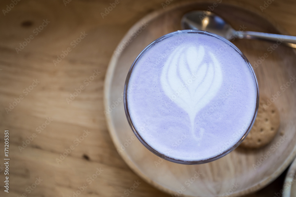 Matcha green tea latte art on wooden table. Matcha green tea latte art on wooden table.