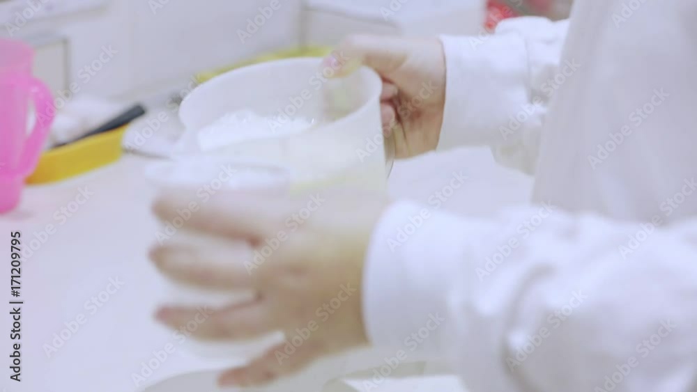 Milk quality control in laboratory. Quality control of dairy products in research laboratory. Milk temperature measurement. Research food products. Milk analysis Milk quality control in laboratory. Quality control of dairy products in research laboratory. Milk temperature measurement. Research food products. Milk analysis