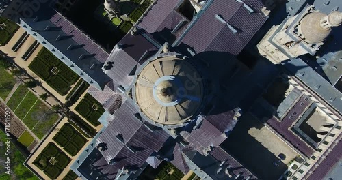 The Royal Seat of San Lorenzo de El Escorial, historical residence of the King of Spain, about 45 kilometers northwest Madrid, in Spain. Amazing aerial view from the top with a wide angle - 13