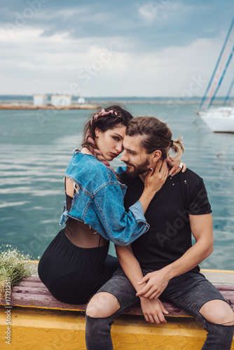 Guy and girl on pier