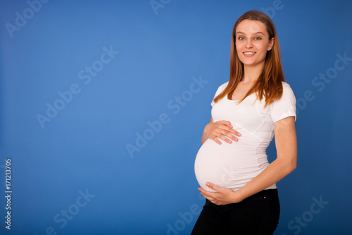 Studio photography of a beautiful pregnant woman