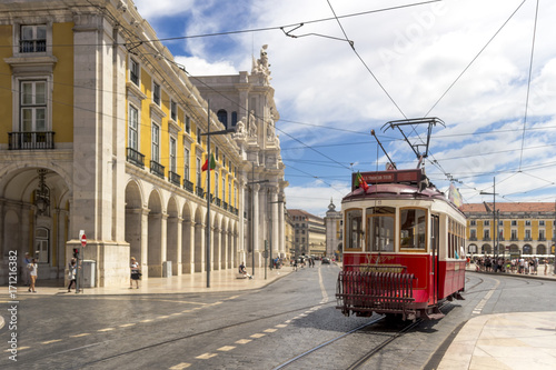 LISBON, PORTUGAL - AUGUST 3, 2017: Old Vintage trolley car in the Trade Square of Lisbon, Portugal, Europe © Sergio