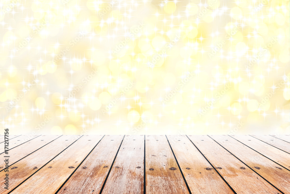 Empty wooden table with shining stars and golden bokeh background blurred. Concept celebration, happy, romantic, gift, valentines Empty wooden table with shining stars and golden bokeh background blurred. Concept celebration, happy, romantic, gift, valentines