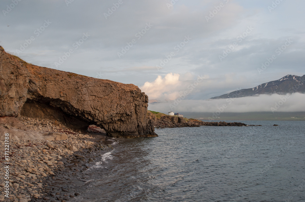 rock on coast of Hrisey in Iceland