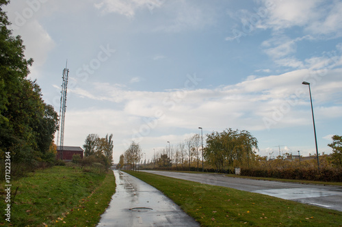 Wet street in town of Ballerup in suburbs of Copenhagen photo