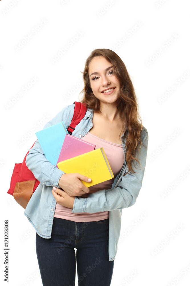 Portrait of student girl with backpack and books on white background Portrait of student girl with backpack and books on white background