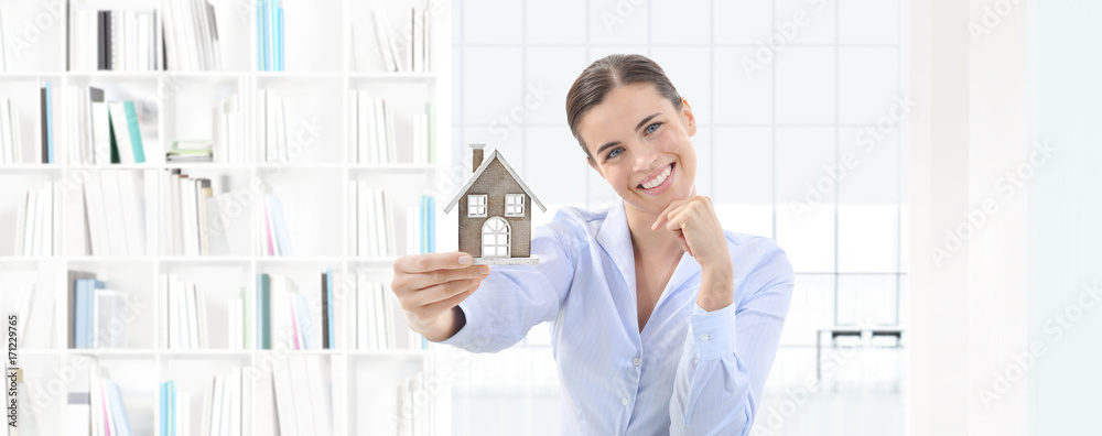 home concept smiling woman showing house model, real estate and design home concept smiling woman showing house model, real estate and design