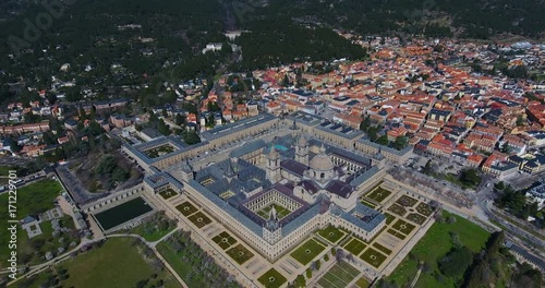 The Royal Seat of San Lorenzo de El Escorial, historical residence of the King of Spain, about 45 kilometers northwest Madrid, in Spain. Amazing aerial view from the top with a wide angle - 1