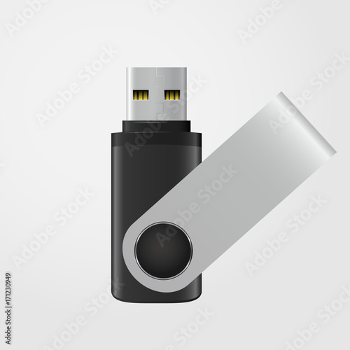 Black and silver USB stick isolated on grey background
