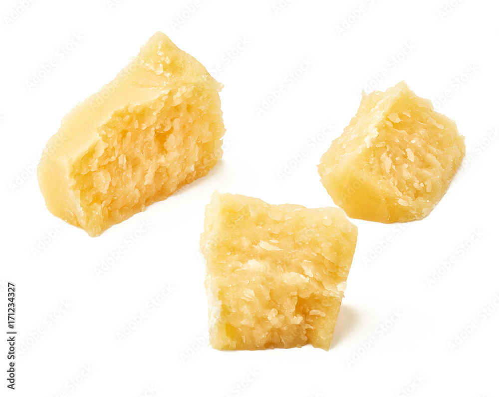 Pieces of Parmesan cheese on white background. Top view.