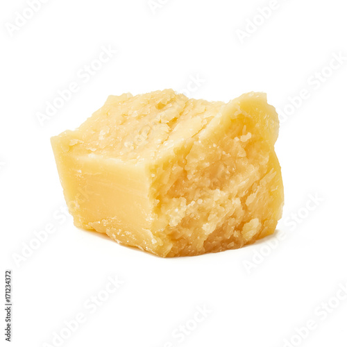 Piece of Parmesan cheese on white background